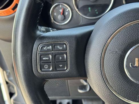 Used 2013 Jeep Wrangler Unlimited Sahara w/ Dual Top Group AWD/4WD image 10