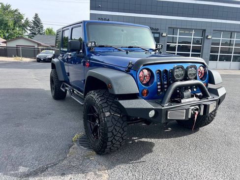 Used 2010 Jeep Wrangler Unlimited Sport AWD/4WD image 1