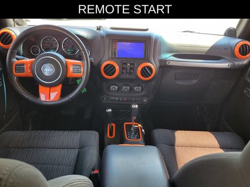 Used 2012 Jeep Wrangler Unlimited Sahara w/ Dual Top Group AWD/4WD image 7