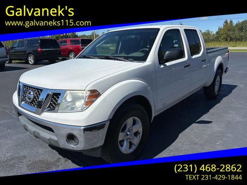 Used 2010 Nissan Frontier SE image 1
