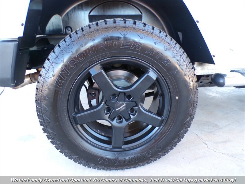 Used 2012 Jeep Wrangler Unlimited Sahara w/ Dual Top Group AWD/4WD image 36
