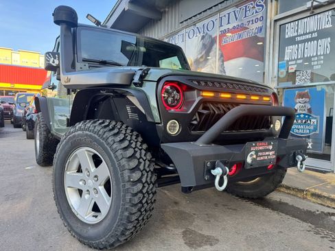 Used 2012 Jeep Wrangler Sport AWD/4WD image 1