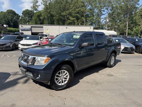 Used 2014 Nissan Frontier SV w/ SV Value Truck Package AWD/4WD image 1