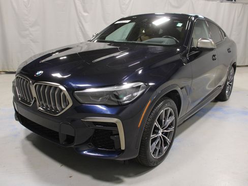 Used 2023 BMW X6 M50i w/ Parking Assistance Package image 1