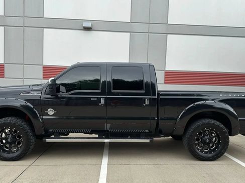 Used 2013 Ford F250 Platinum w/ FX4 Off Road Pkg AWD/4WD image 1