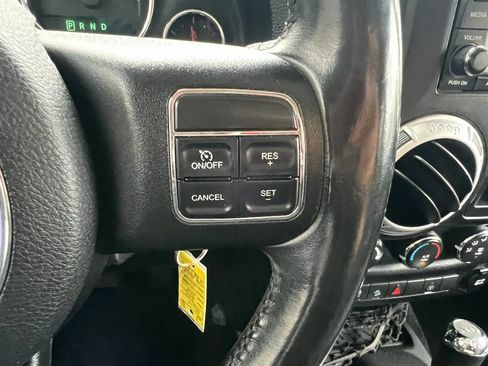 Used 2014 Jeep Wrangler Unlimited Sahara w/ Dual Top Group AWD/4WD image 18