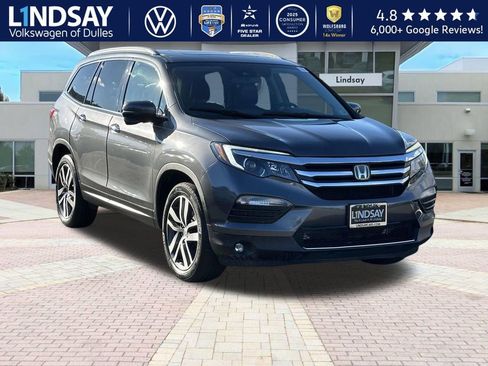 Used 2016 Honda Pilot Touring image 1