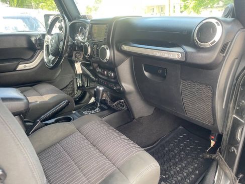 Used 2012 Jeep Wrangler Unlimited Sahara w/ Dual Top Group AWD/4WD image 25