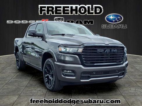 Used 2025 RAM 1500 Laramie w/ Night Edition AWD/4WD image 1