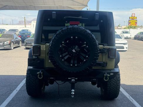 Used 2013 Jeep Wrangler Unlimited Rubicon w/ Dual Top Group AWD/4WD image 7