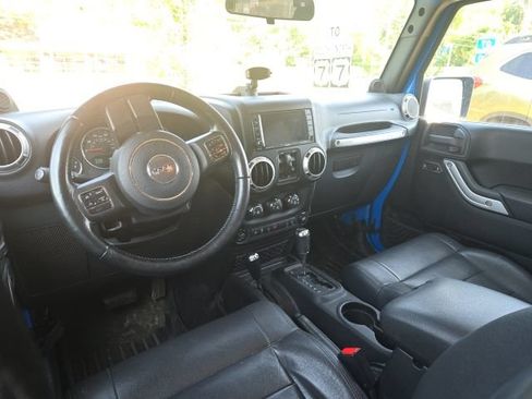Used 2011 Jeep Wrangler Unlimited Sahara w/ Dual Top Group AWD/4WD image 2