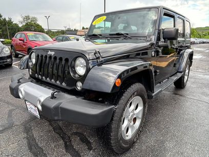 Used 2015 Jeep Wrangler Unlimited Sahara w/ Dual Top Group