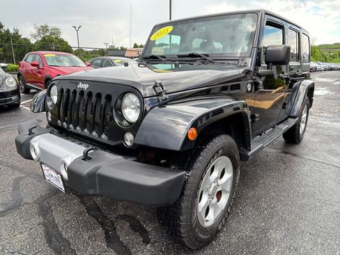 Used 2015 Jeep Wrangler Unlimited Sahara w/ Dual Top Group AWD/4WD image 1