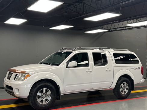 Used 2012 Nissan Frontier PRO-4X w/ Pro-4x Luxury Pkg image 1