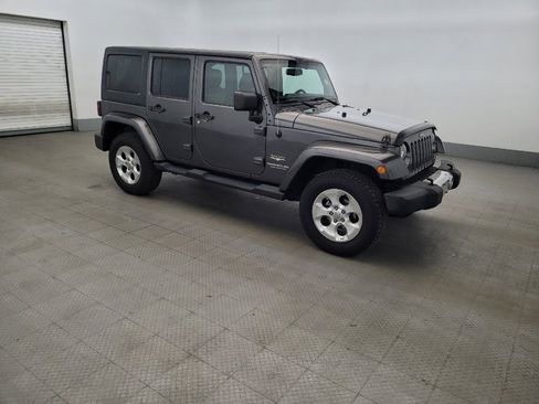 Used 2014 Jeep Wrangler Unlimited Sahara w/ Dual Top Group AWD/4WD image 11