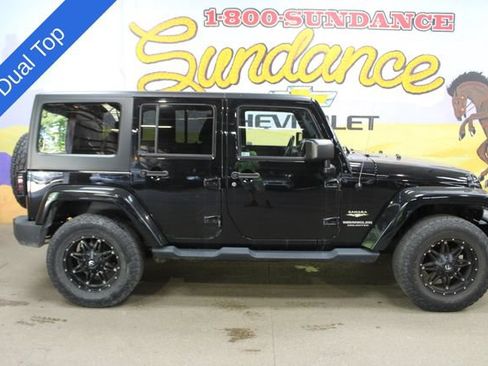 Used 2014 Jeep Wrangler Unlimited Sahara w/ Dual Top Group AWD/4WD image 1