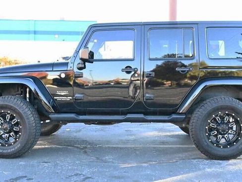 Used 2015 Jeep Wrangler Unlimited Sahara w/ Dual Top Group AWD/4WD image 6