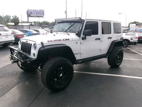 Used 2013 Jeep Wrangler Unlimited Rubicon w/ Dual Top Group AWD/4WD image 7