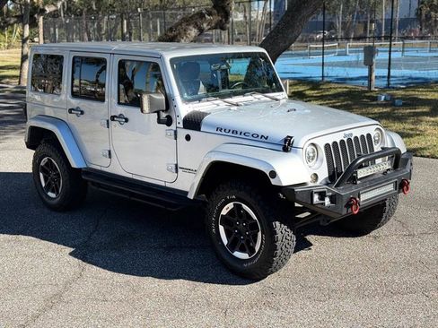 Used 2012 Jeep Wrangler Unlimited Rubicon w/ Dual Top Group image 7