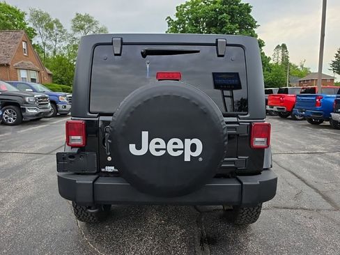 Used 2013 Jeep Wrangler Unlimited Sahara w/ Dual Top Group AWD/4WD image 6
