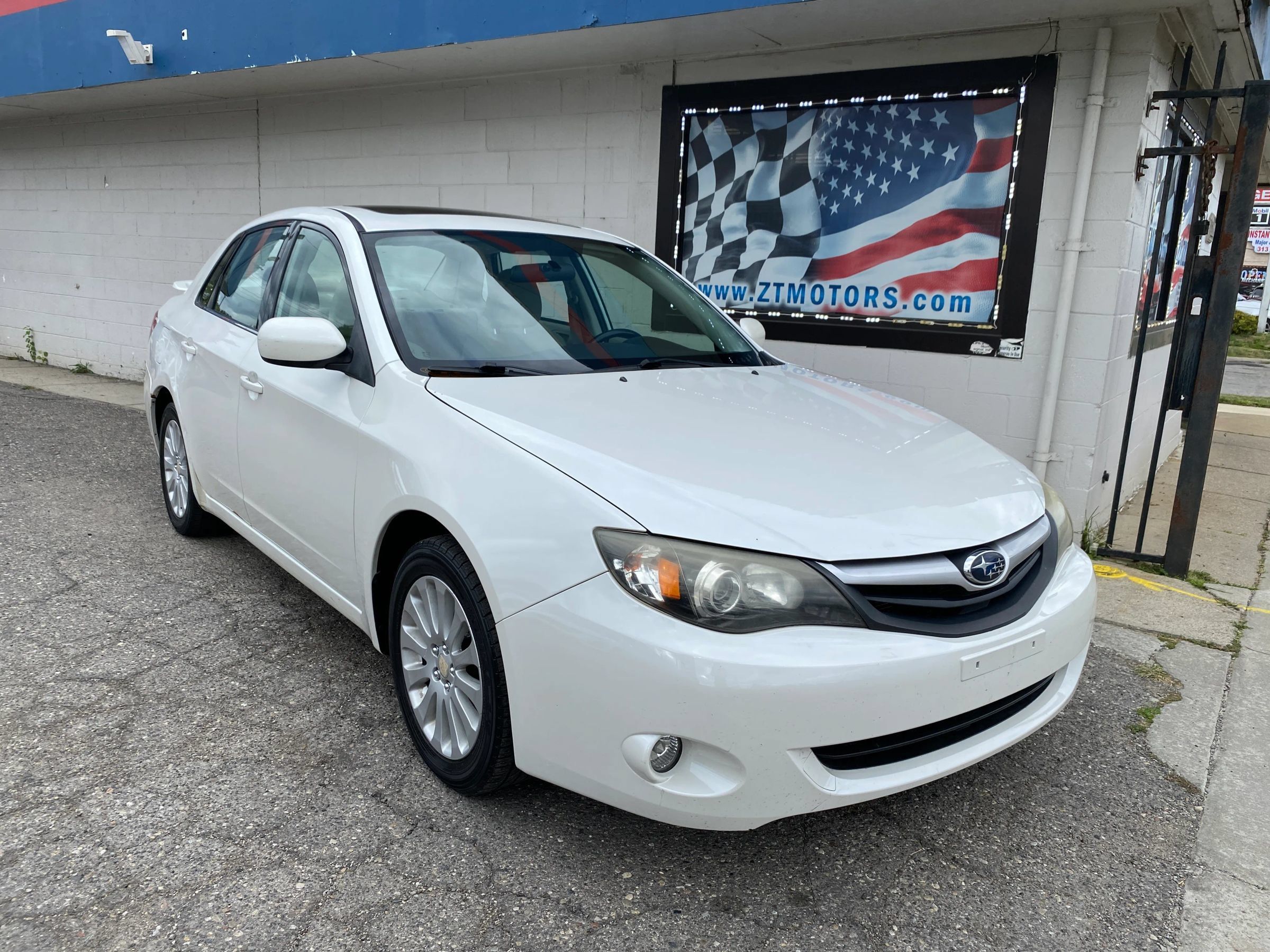 Used 2011 Subaru Impreza 2.5i Premium w/ PWR Moonroof Value Pkg AWD/4WD image 1