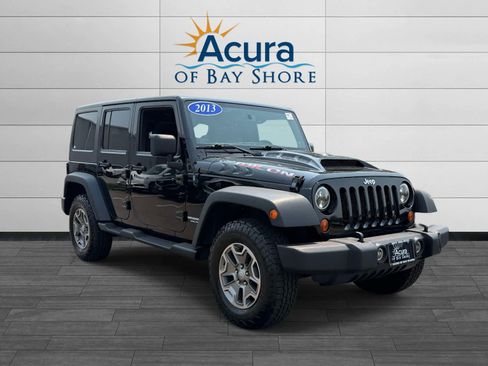 Used 2013 Jeep Wrangler Unlimited Rubicon w/ Dual Top Group AWD/4WD image 4