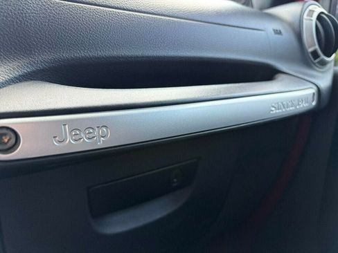Used 2013 Jeep Wrangler Unlimited Sahara w/ Dual Top Group AWD/4WD image 16