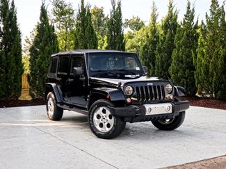 Used 2014 Jeep Wrangler Unlimited Sahara w/ Max Tow Package AWD/4WD video 2
