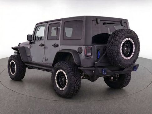 Used 2014 Jeep Wrangler Unlimited Sahara w/ Max Tow Package AWD/4WD image 7