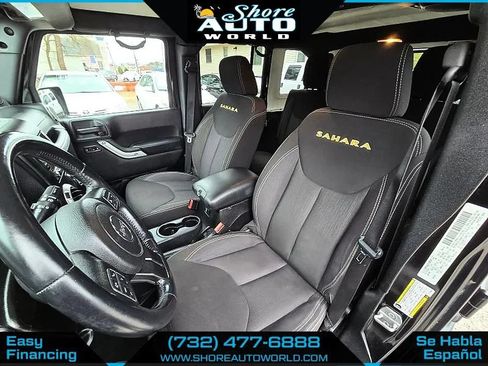 Used 2014 Jeep Wrangler Unlimited Sahara w/ Dual Top Group AWD/4WD image 15