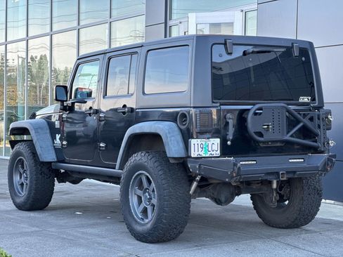 Used 2012 Jeep Wrangler Unlimited Rubicon w/ Dual Top Group AWD/4WD image 7