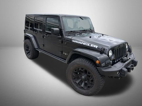 Used 2017 Jeep Wrangler Unlimited Sahara AWD/4WD image 1
