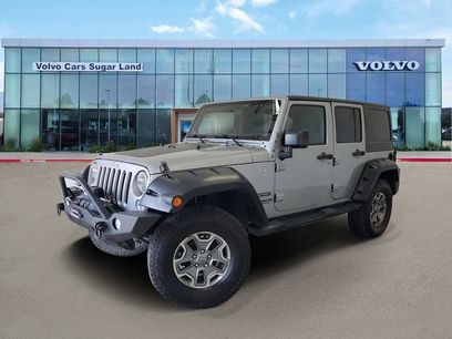 Used 2014 Jeep Wrangler Unlimited Sport