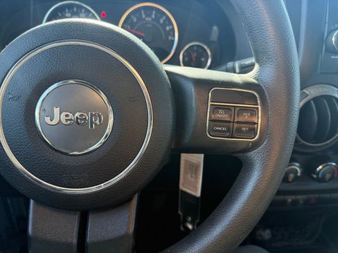 Used 2013 Jeep Wrangler Unlimited Sport AWD/4WD image 19