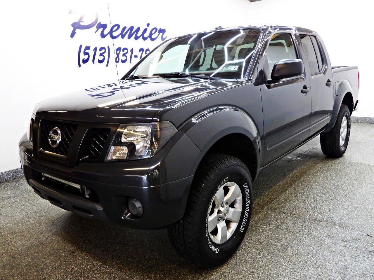 Used 2012 Nissan Frontier SV w/ SV Premium Utility Pkg AWD/4WD image 1
