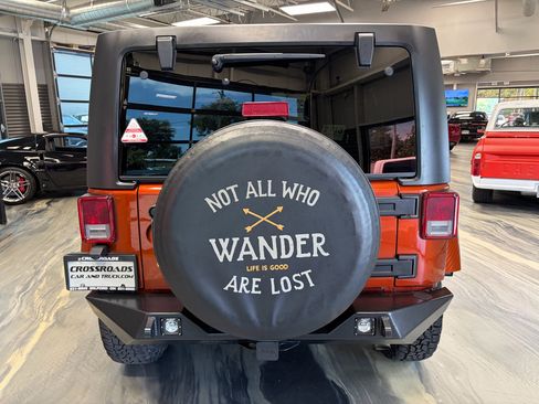 Used 2014 Jeep Wrangler Unlimited Sahara w/ Dual Top Group AWD/4WD image 29