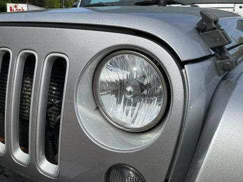 Used 2016 Jeep Wrangler Unlimited Sahara w/ Max Tow Package AWD/4WD image 24
