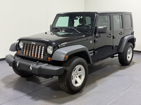 Used 2013 Jeep Wrangler Unlimited Sport AWD/4WD image 1