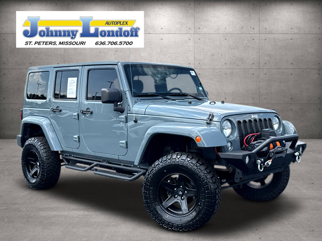 Used 2014 Jeep Wrangler Unlimited Sahara w/ Dual Top Group AWD/4WD image 1