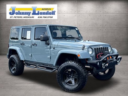 Used 2014 Jeep Wrangler Unlimited Sahara w/ Dual Top Group AWD/4WD image 1