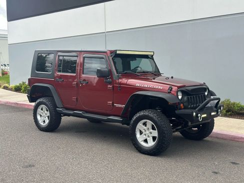 Used 2010 Jeep Wrangler Unlimited Rubicon w/ Dual Top Group image 7