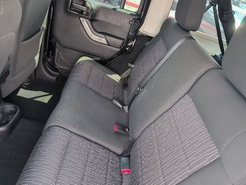 Used 2012 Jeep Wrangler Unlimited Sahara w/ Dual Top Group image 11