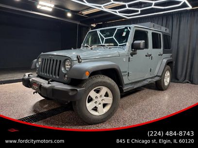 Used 2014 Jeep Wrangler Unlimited Sport w/ Dual Top Group