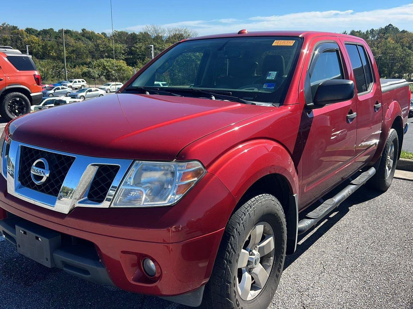 Used 2013 Nissan Frontier SV w/ SV Value Truck Pkg AWD/4WD image 1