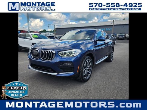 Used 2021 BMW X4 xDrive30i AWD/4WD image 1