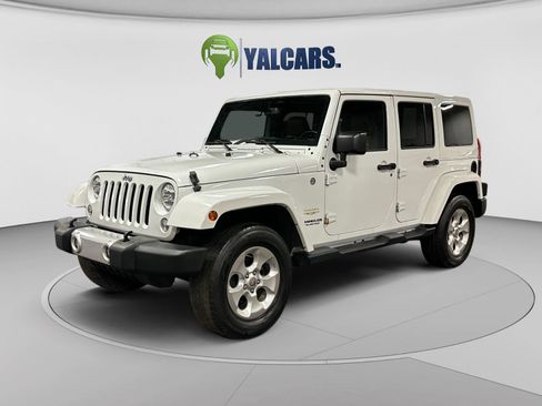 Used 2015 Jeep Wrangler Unlimited Sahara AWD/4WD image 1