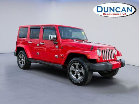 Used 2017 Jeep Wrangler Unlimited Sahara w/ Dual Top Group AWD/4WD image 1