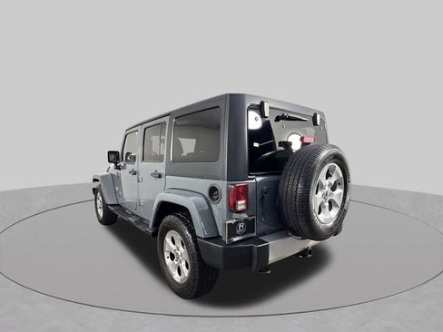 Used 2014 Jeep Wrangler Unlimited Sahara w/ Dual Top Group AWD/4WD image 29