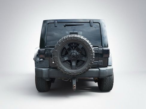 Used 2012 Jeep Wrangler Unlimited Rubicon w/ Dual Top Group AWD/4WD image 2