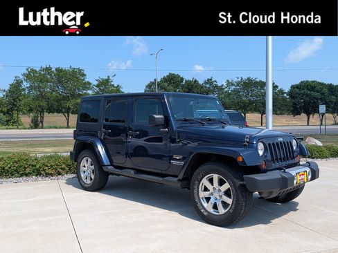 Used 2013 Jeep Wrangler Unlimited Sahara w/ Trailer Tow Group AWD/4WD image 1
